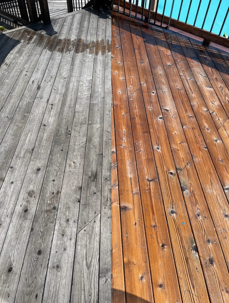 Backyard wood deck cleaned before summer gathering with furniture moved aside